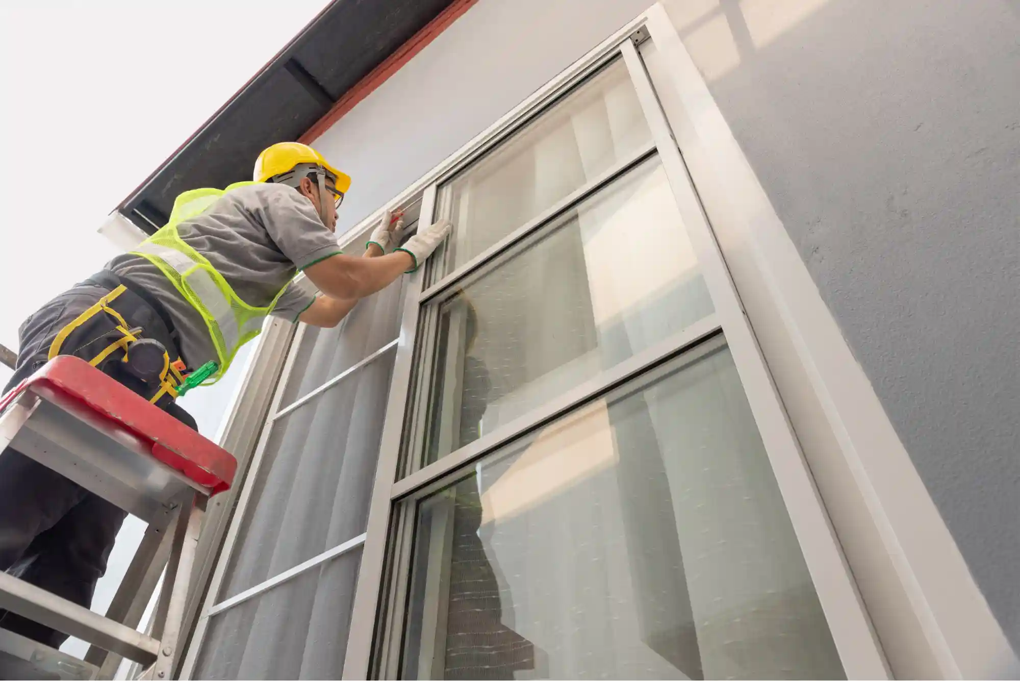 measuring window from ladder